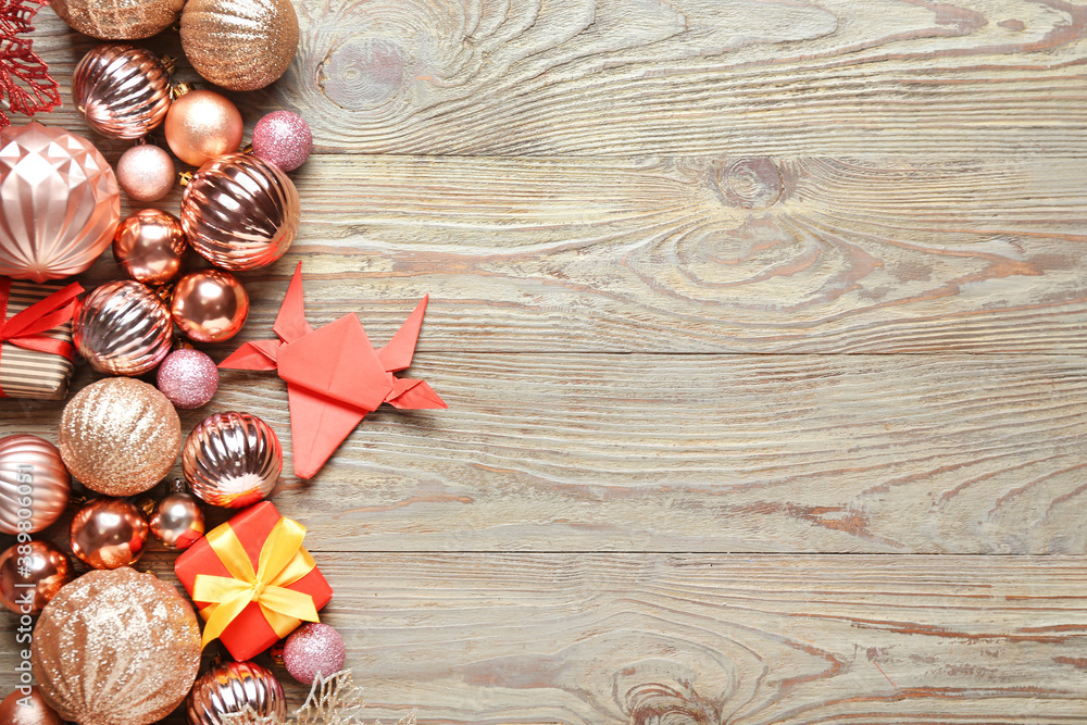 New Year composition with origami bull on wooden background New Year composition with origami bull on wooden background
