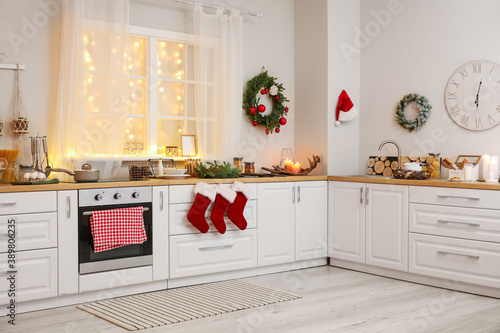 Interior of modern kitchen decorated for Christmas photo