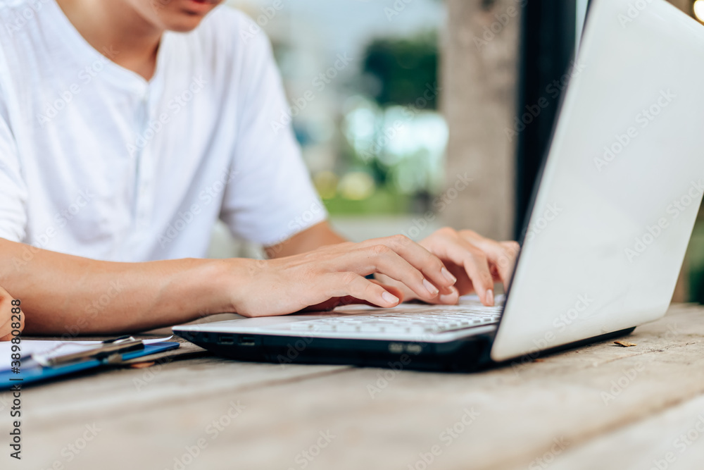 Fototapeta premium High school or college students group catching up workbook and learning tutoring on desk and reading, doing homework, lesson practice preparing exam.