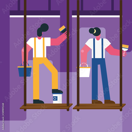 constructors workers couple remodeling painting in scaffold