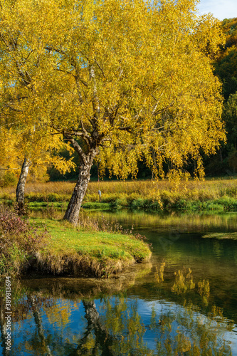 River Blau near Blaubeuren in fall autumn color. walking hiking, relaxing