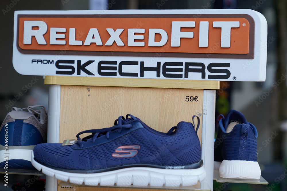 Skechers storefront logo and text sign advertising of athletic footwear  brand from United States Stock Photo | Adobe Stock