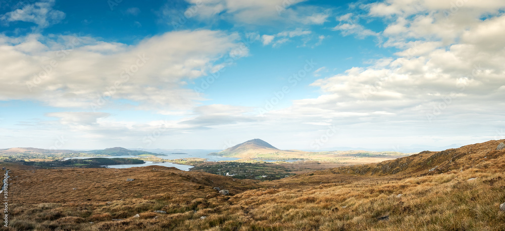 View from Diamond hill in Connemara National park, county Galway, Ireland, Bright sunny day, blue cloudy sky.