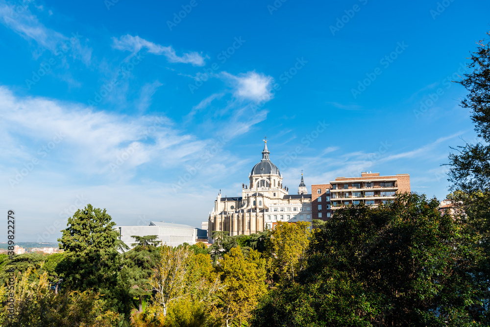 Cityscape of Madrid with Almudena Cathedral a blue sky day during Autumn