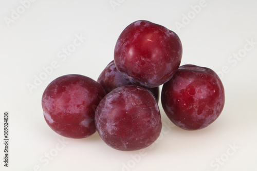 Sweet ripe plum isolated on white
