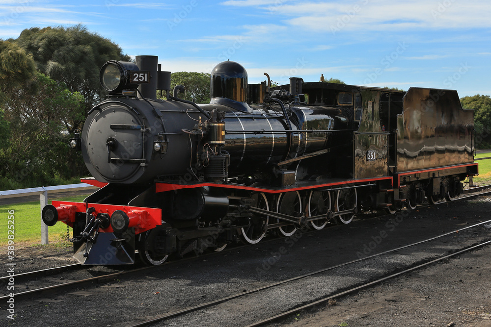 Walkers Ltd narrow gauge steam locomotive T251 (built 1917) with two carriages at Queenscliff railway station in Victoria, Australia. Walkers Ltd narrow gauge steam locomotive T251 (built 1917) with two carriages at Queenscliff railway station in Victoria, Australia.