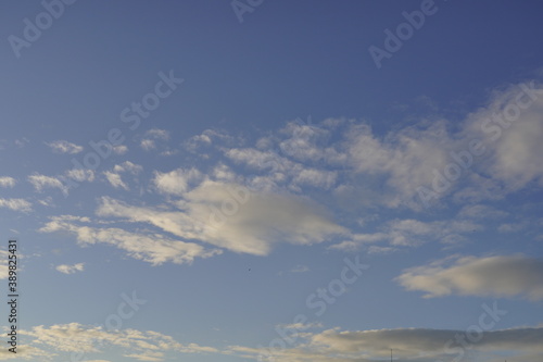 white cloudy blue background sky © Ali Tellioglu