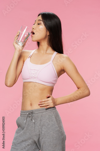 Sporty woman slim figure glass with water health  © SHOTPRIME STUDIO