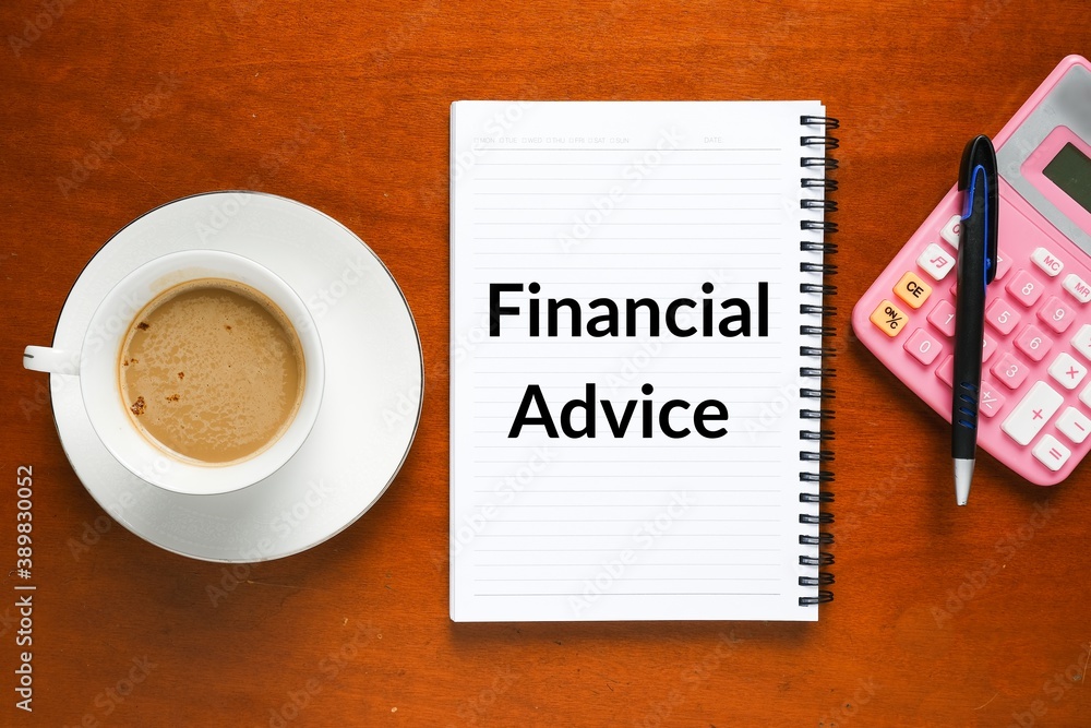 Flatlay picture of financial advice at notebook, calculator, pen and a cup of coffee. Flatlay picture of financial advice at notebook, calculator, pen and a cup of coffee.