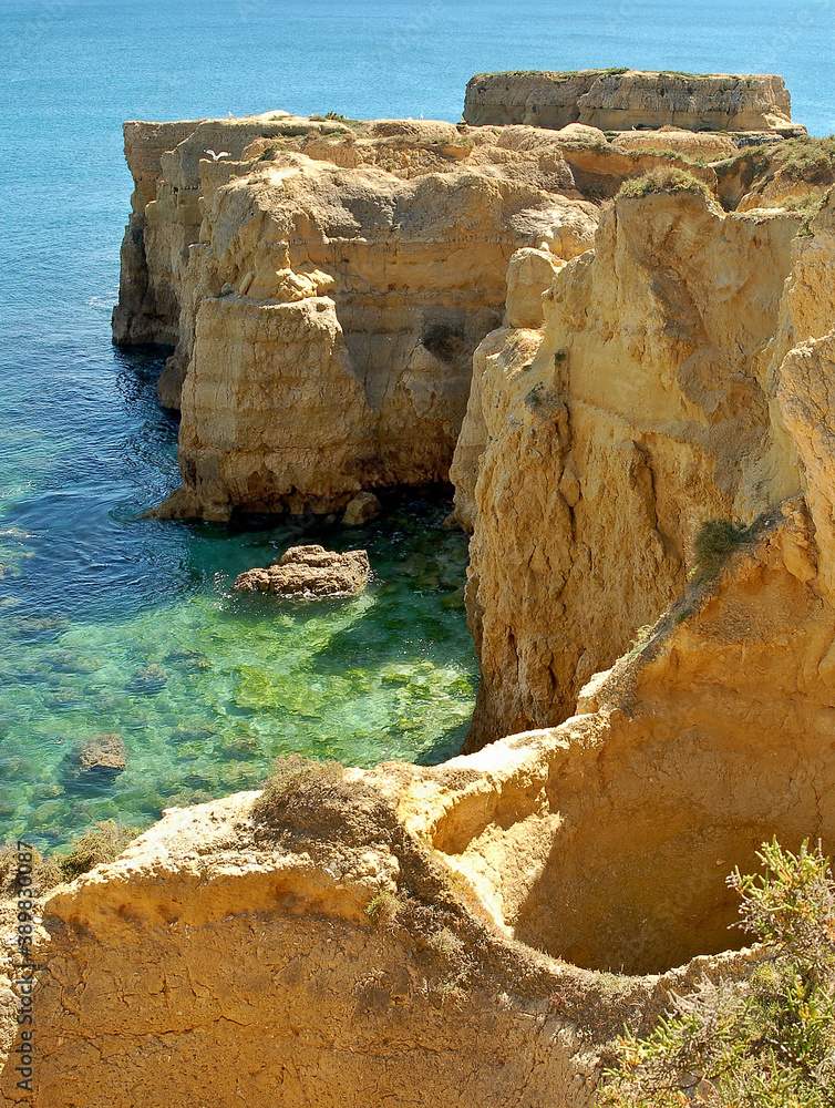 Great colorful nature on the Algarve Atlanyic coast with bizarre shaped sandstone rocks