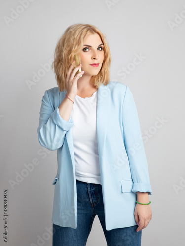 girl talking on the phone, business conversation © Alla