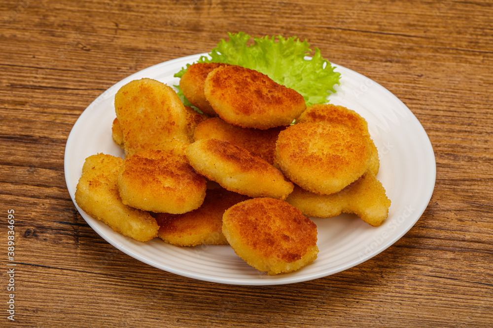Fried chicken nuggets served salad leaves Fried chicken nuggets served salad leaves