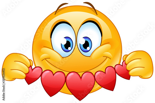 Happy emoji emoticon holding hearts garland bunting cutouts paper banner