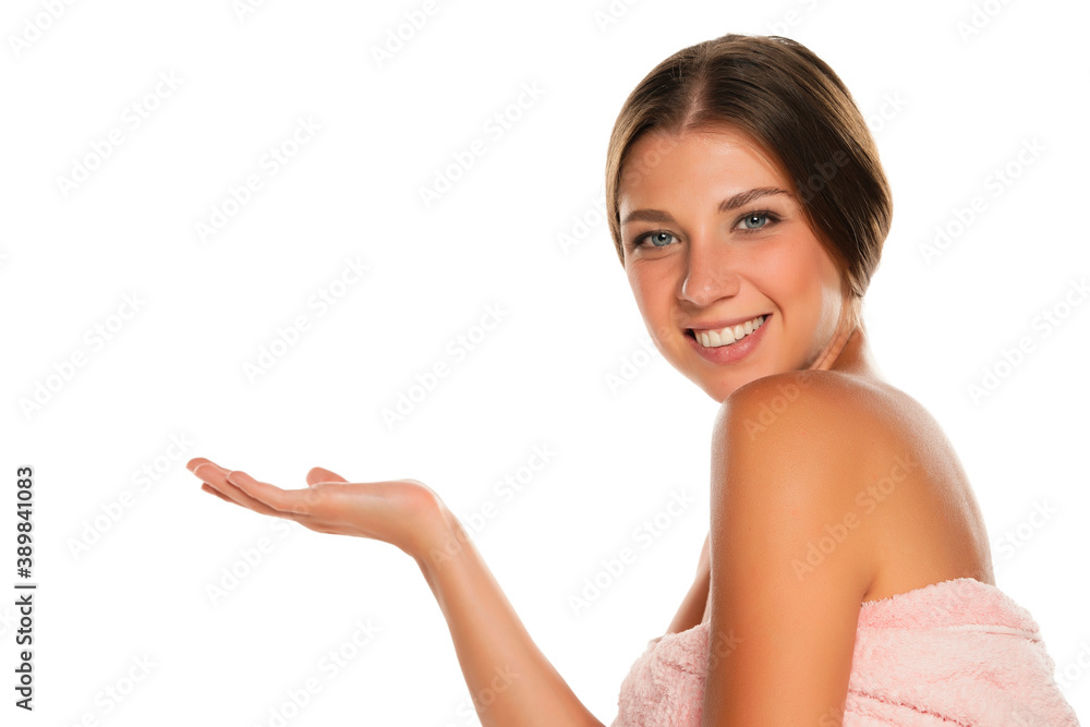 Portrait of a young smiling advertizing shirtless beautiful woman Portrait of a young smiling advertizing shirtless beautiful woman