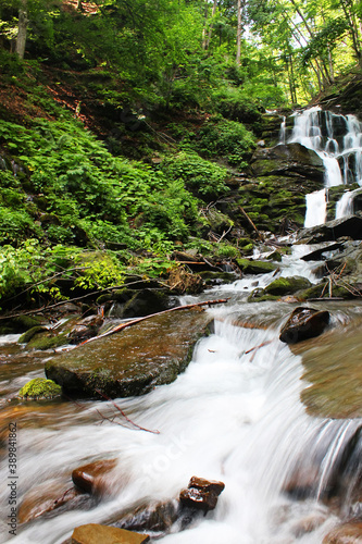 Famous waterfall Shypit (Shypot) near Volovetz in Carpathian mountains, Transcarpathia, Western Ukraine. Long exposure, soft selective focus photo