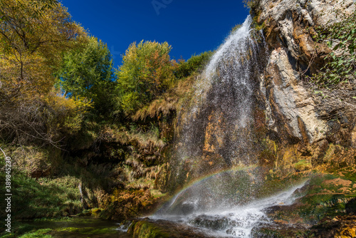 Sparkling waterfall near Jucar river source, long exposure photo