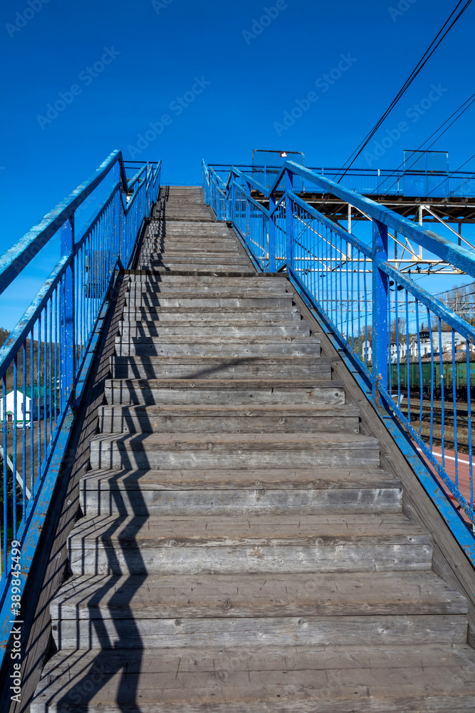 Stairs to the pedestrian crossing over the access roads at railway station