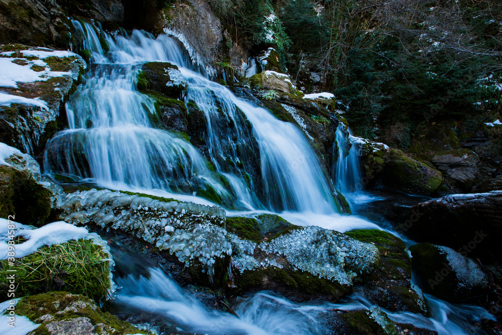 Fototapeta premium Winter in Llobregat river waterfall, Barcelona, Pyrenees, Spain