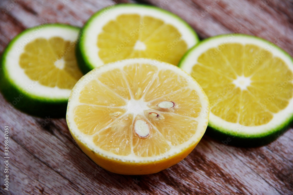 round yellow lemon slices on decorative plate round yellow lemon slices on decorative plate