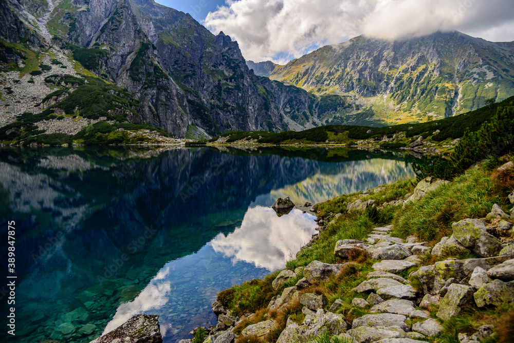 Naklejka premium Morskie Oko, or Eye of the Sea in English, is the largest and fourth-deepest lake in the Tatra Mountains, in southern Poland.