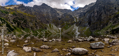 Fototapeta Naklejka Na Ścianę i Meble -  Czarny Staw pod Rysami (Black Lake below Mount Rysy) is a mountain lake on the Polish side of Mount Rysy in the Tatra mountains. At 1,583 m above sea level, it overlooks the nearby lake of Morskie Oko