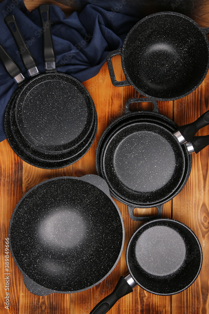 set of pots and pans top view. Mockup, kitchen utensils, recipe book, cooking classes concept set of pots and pans top view. Mockup, kitchen utensils, recipe book, cooking classes concept