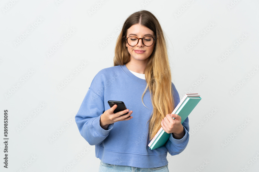 Young blonde student woman isolated on white background thinking and sending a message Young blonde student woman isolated on white background thinking and sending a message
