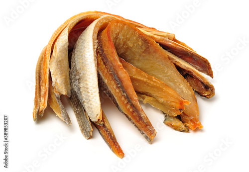 Dried salted fishes on white background