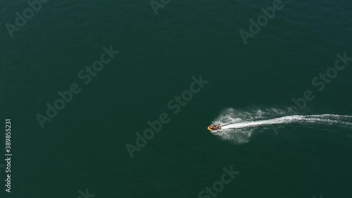Wallpaper Mural Aerial view of water scooter on water. Fast movement of water scooter on water.  Torontodigital.ca