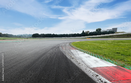 Point of view surface asphalt track motorsport circuit background turn curb close up