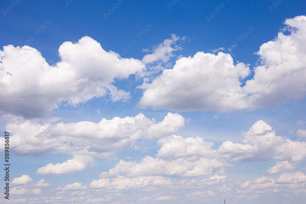 cumulus clouds against blue sky cumulus clouds against blue sky