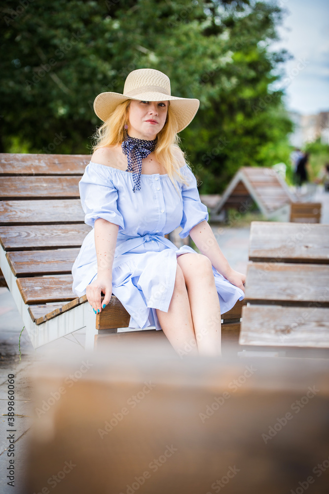 Fototapeta premium blonde in a blue dress