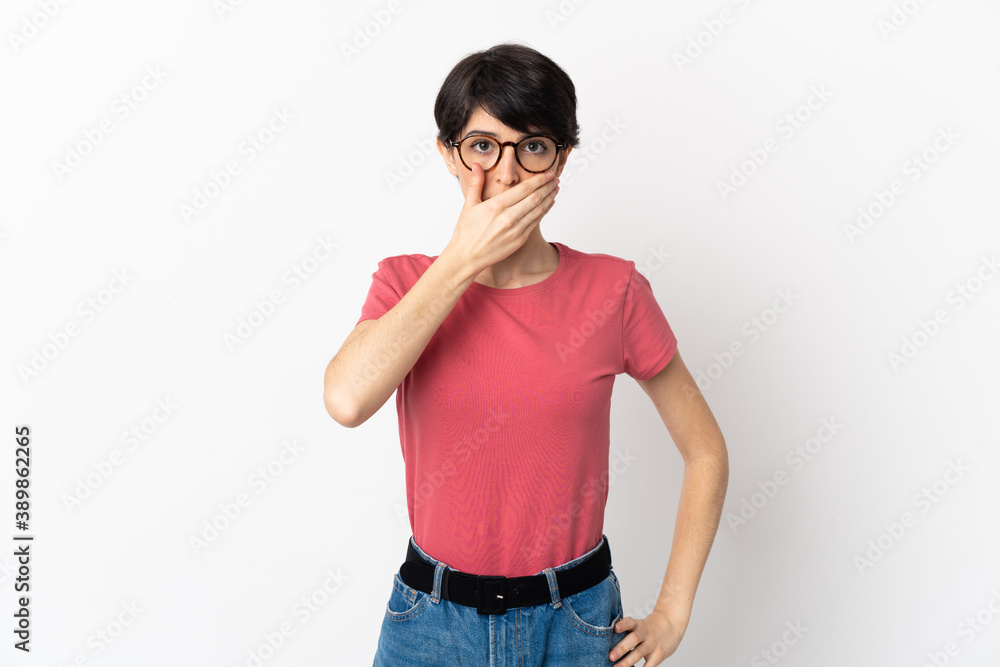 Woman with short hair isolated on white background covering mouth with hand Woman with short hair isolated on white background covering mouth with hand