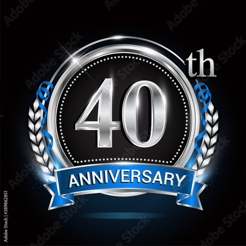 40th silver anniversary logo with blue ribbon and ring.
