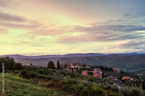 Epic Morning Sky Over Tuscany Landscape with Village