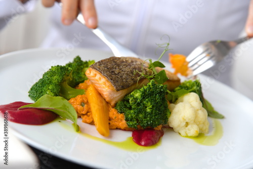 Obraz na płótnie Fish dish served on a white plate.