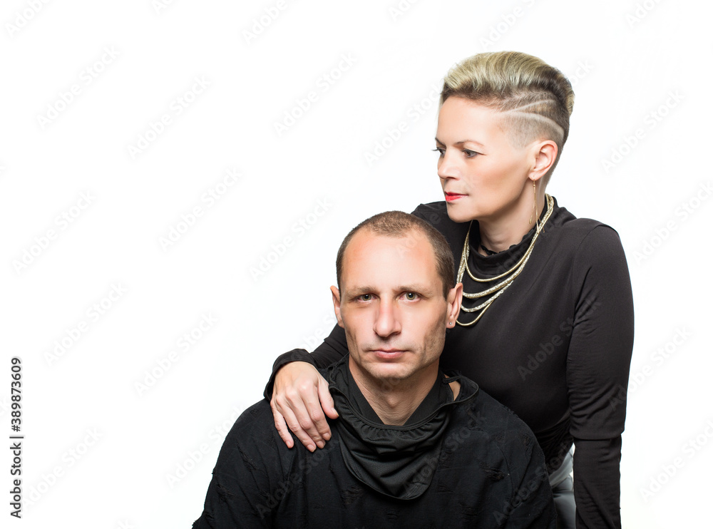 Close up portrait of beautiful happy couple, family. Stylish haircut. Man and Woman on White Background . Studio shot, Selective focus. Copy space for any design. Close up portrait of beautiful happy couple, family. Stylish haircut. Man and Woman on White Background . Studio shot, Selective focus. Copy space for any design.