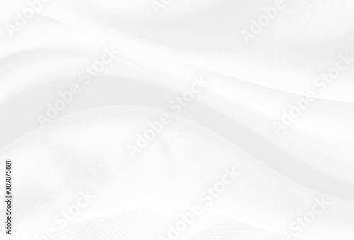 White and grey Smooth elegant background with cloth soft waves. Cloth texture can use as background design. © khanunza