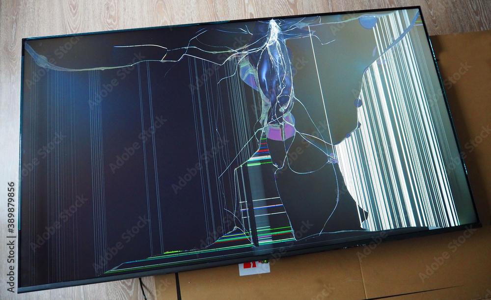 Broken led TV matrix. Damage to the screen of a modern TV as a result of  impact or fall. Stock Photo | Adobe Stock