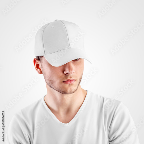 Template of a white baseball cap on a guy's head, headdress for protection from the sun, isolated on background.