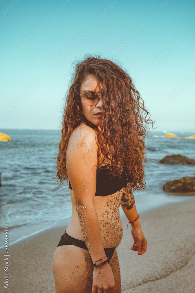 woman in bikini on the beach woman in bikini on the beach