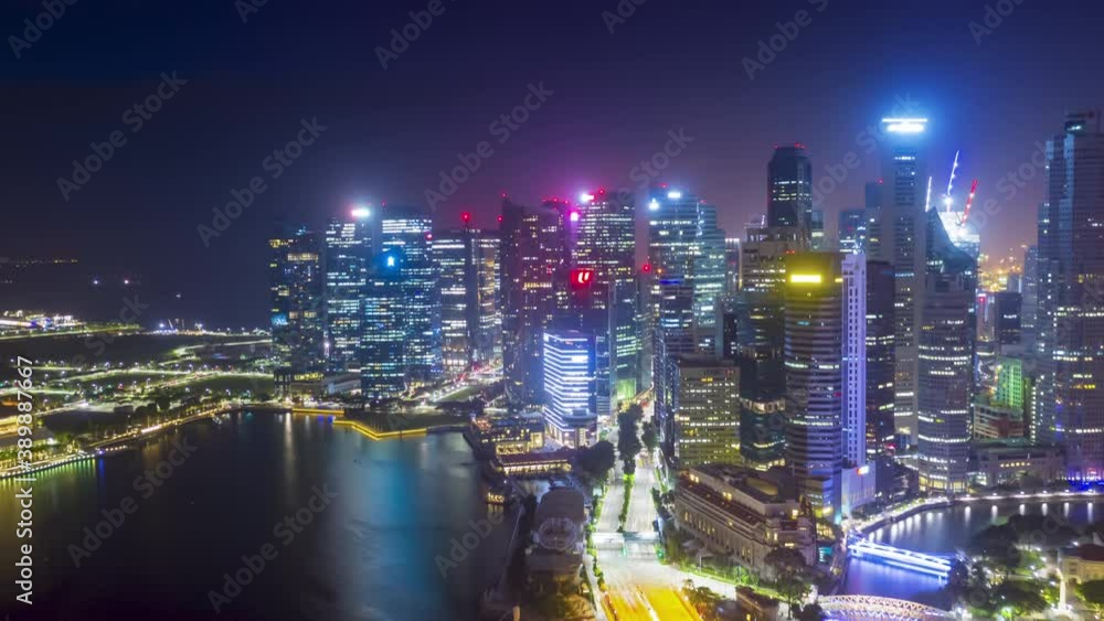 SINGAPORE - FEBRUARY 2: Hyper lapse Aerial drone view of Singapore business district and city, Marina Bay is bay located in the Central Area of Singapore on February 2, 2020 in Singapore. SINGAPORE - FEBRUARY 2: Hyper lapse Aerial drone view of Singapore business district and city, Marina Bay is bay located in the Central Area of Singapore on February 2, 2020 in Singapore.