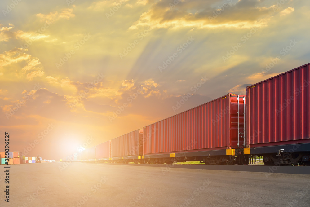 Obraz premium Cargo train platform with freight train Containers on Transport of cargos by rail in container, railway infrastructure on sunset background.