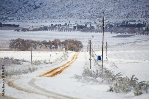 Close up view of the road leading up to Matroosberg outside Ceres in the Western Cape after a good snowfall in the Winter