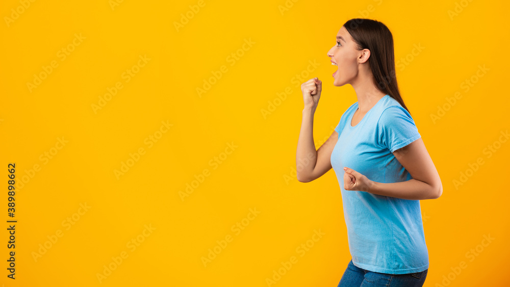 Portrait of cheering lady looking at copy space Portrait of cheering lady looking at copy space