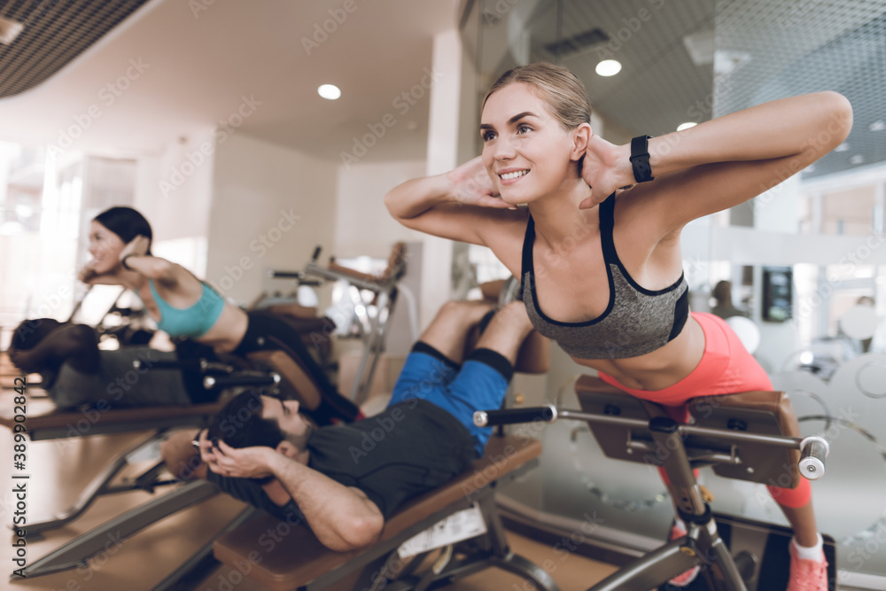 Sporty girl smiles and pumps press. Sporty girl smiles and pumps press.