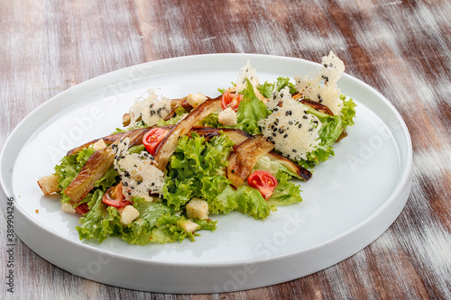 Salad with baked eggplant, mozzarella and romaine lettuce