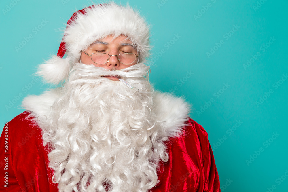 Santa Claus measuring temperature using thermometer Santa Claus measuring temperature using thermometer