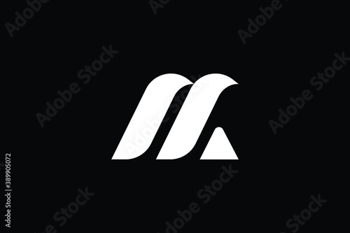 AM logo letter design on luxury background. MA logo monogram initials letter concept. AM icon logo design. MA elegant and Professional letter icon design on black background. AM MA photo