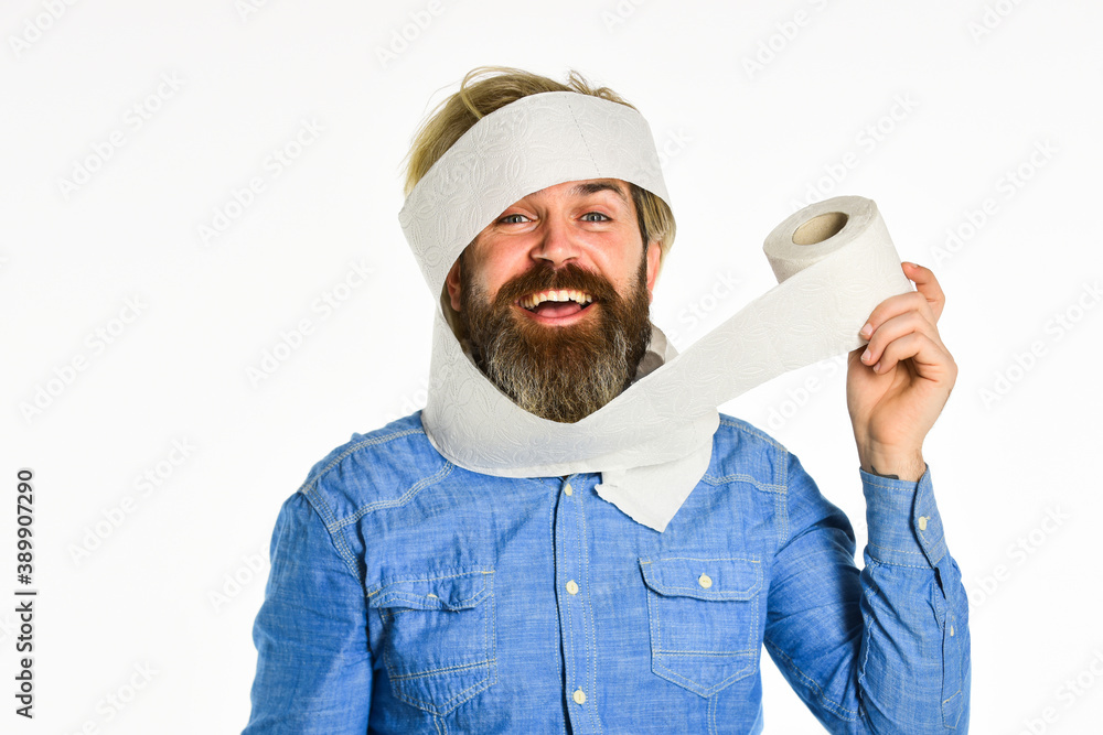 Essential goods. Consumerism. Man hold toilet paper. Hipster with tissue.  limit usage. Online shop. Guy having fun with toilet paper. Softness  strength and absorbency. Prevent Toilet Paper Hoarding Stock Photo | Adobe